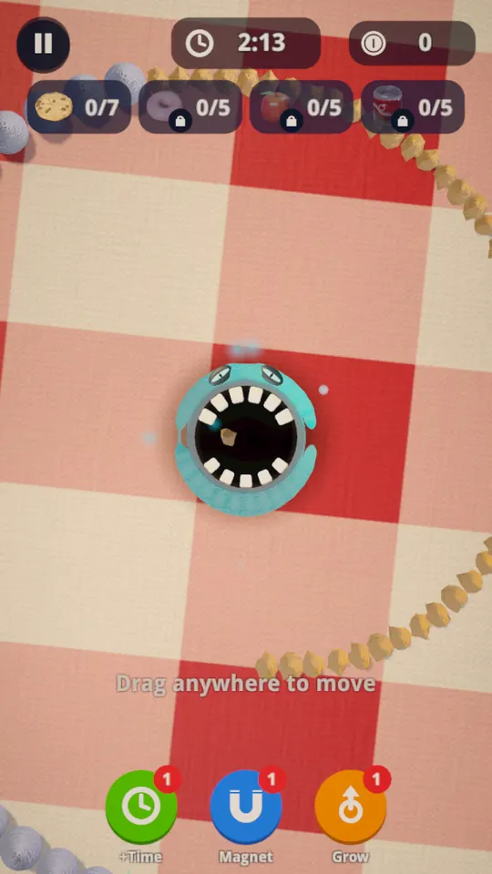 A teal monster mouth chomping its way across a picnic blanket