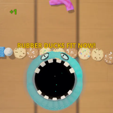 Monster mouth on a bedroom floor with rubber ducks